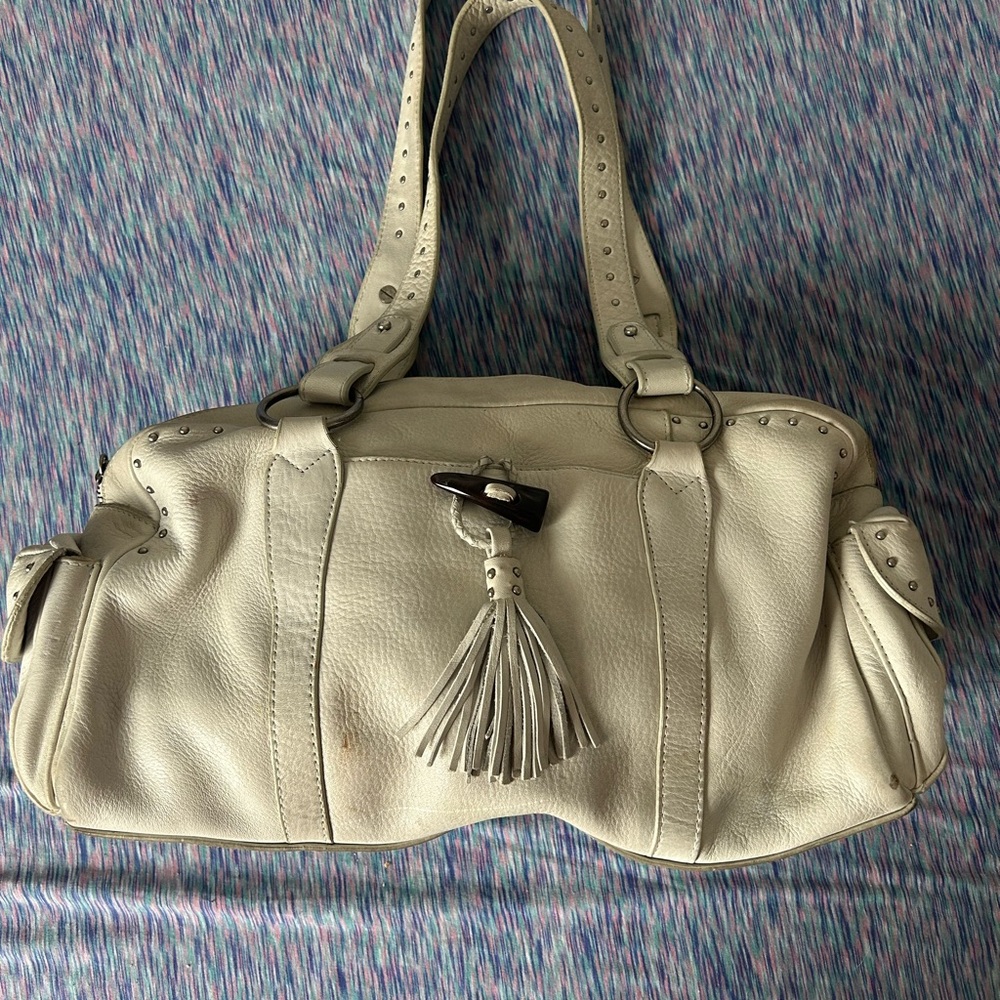 Elegant Cream Handbag with Tassel